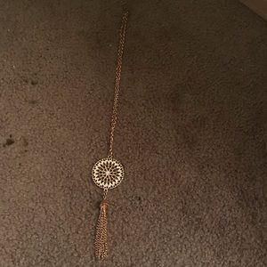 long gold necklace